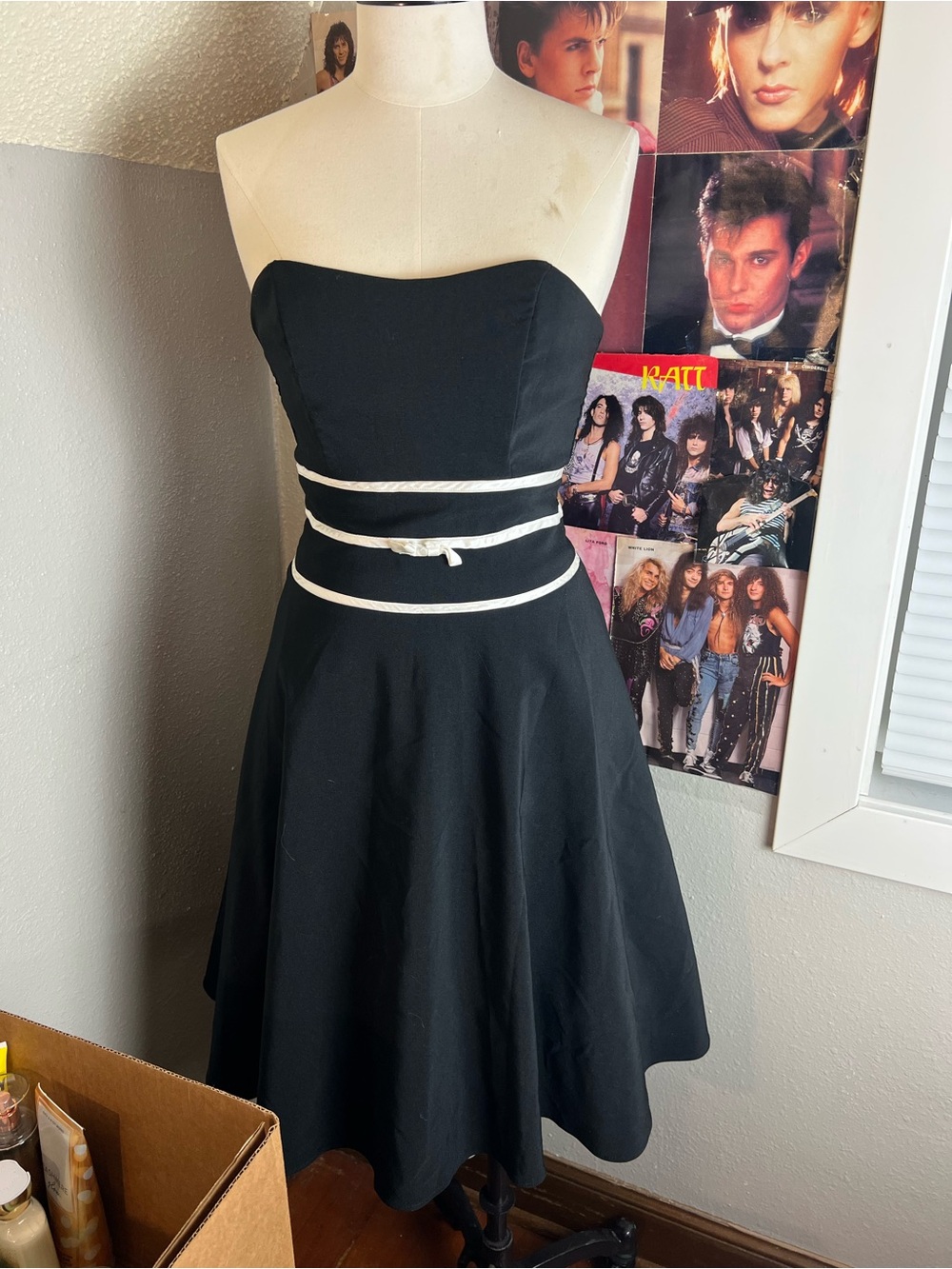 Elegant Black Strapless Fit-and-Flare Dress with White Waist Accents